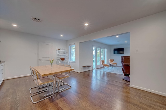 dining room featuring wood-type flooring