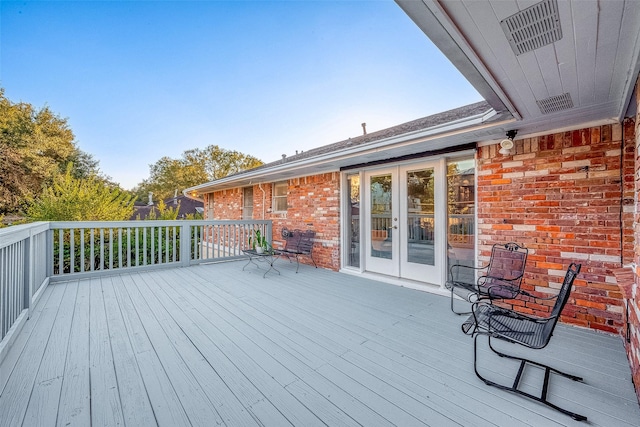 wooden terrace with french doors