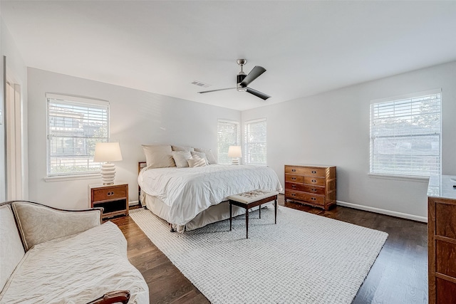 bedroom featuring dark wood-type flooring and ceiling fan