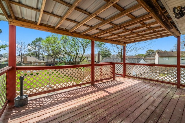 wooden terrace with a residential view