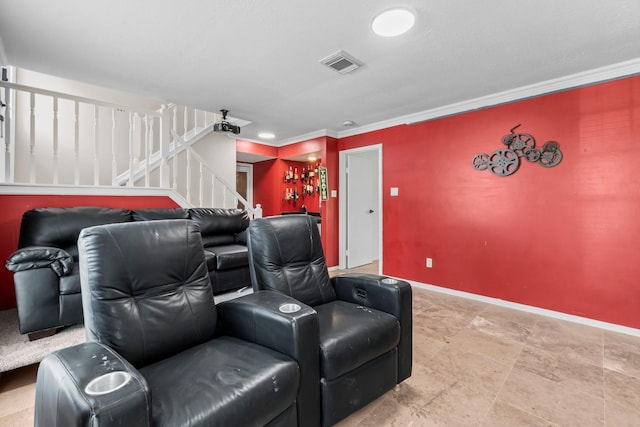 cinema with visible vents, crown molding, and baseboards
