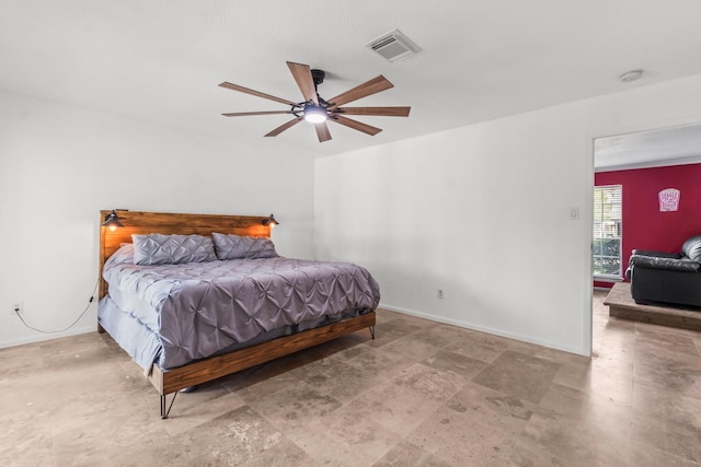bedroom featuring ceiling fan, baseboards, and visible vents