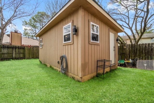 view of outbuilding with a fenced backyard