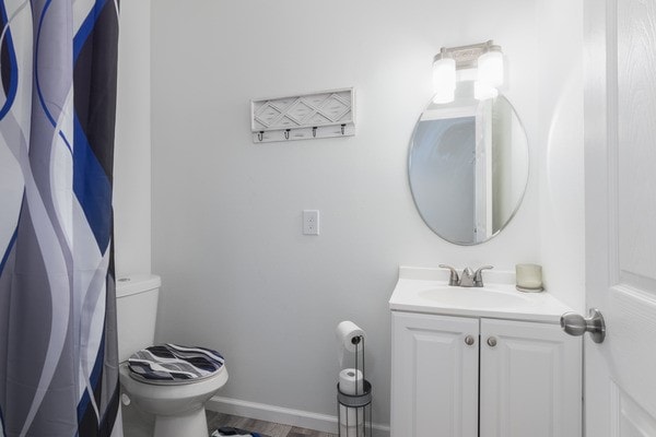 bathroom with vanity and toilet