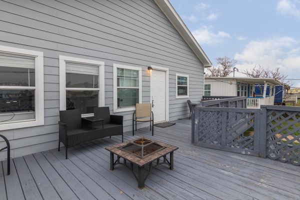 deck featuring a fire pit