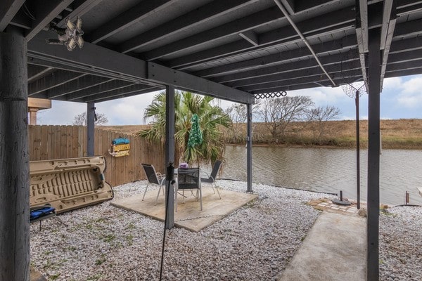 view of patio / terrace featuring a water view