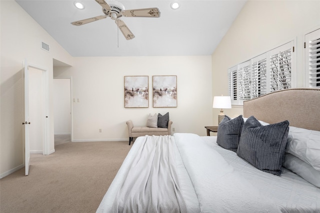 carpeted bedroom featuring lofted ceiling and ceiling fan