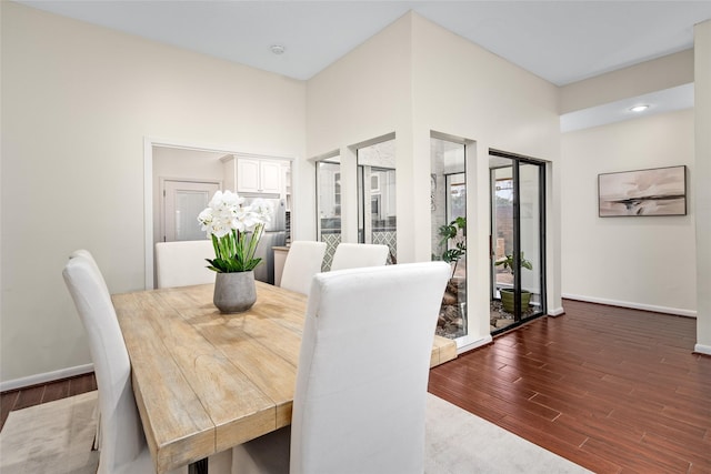 dining area featuring dark hardwood / wood-style flooring