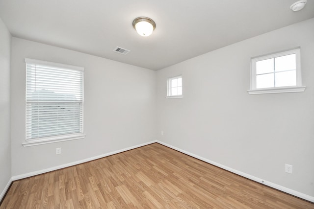 empty room featuring light hardwood / wood-style floors