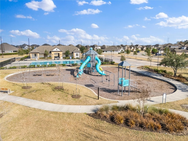 community play area featuring a residential view