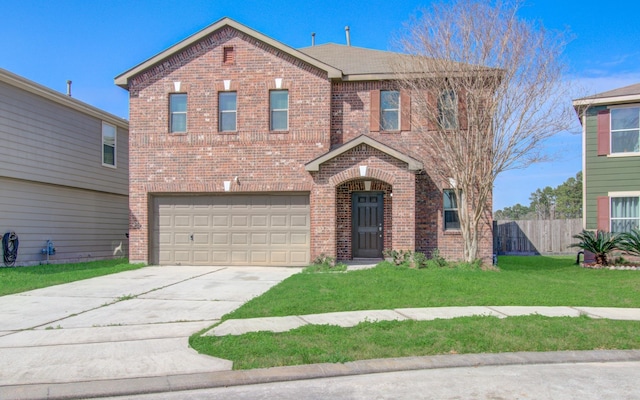 view of front of home with a garage and a front yard