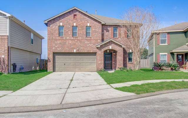 view of front of home featuring a garage and a front lawn