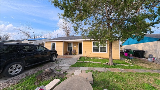 view of front of property with a front yard