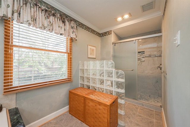 full bath with a shower stall, visible vents, baseboards, and ornamental molding