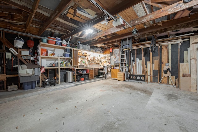 basement with a workshop area