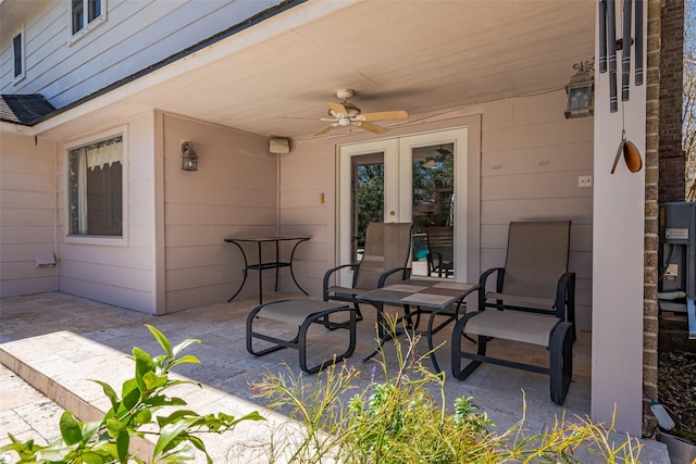 view of patio featuring ceiling fan and french doors