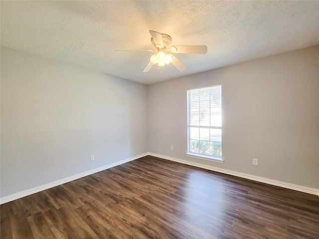 unfurnished room with ceiling fan, a textured ceiling, and dark hardwood / wood-style flooring