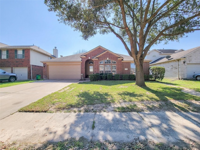 ranch-style house featuring a garage and a front lawn