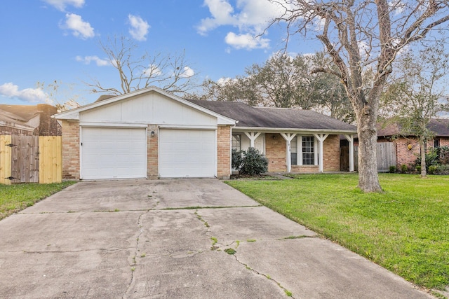 ranch-style house featuring a garage and a front lawn