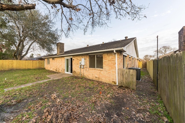 back of house with cooling unit