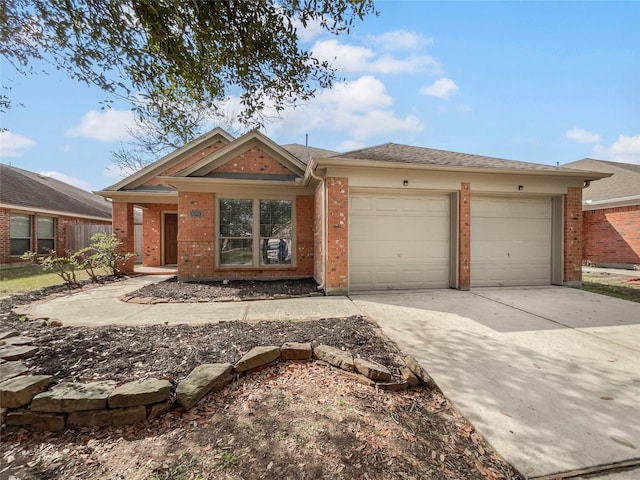 single story home with a garage, concrete driveway, and brick siding