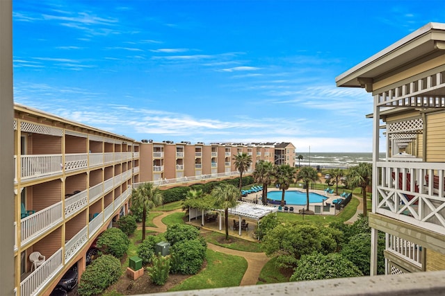 view of pool with a water view