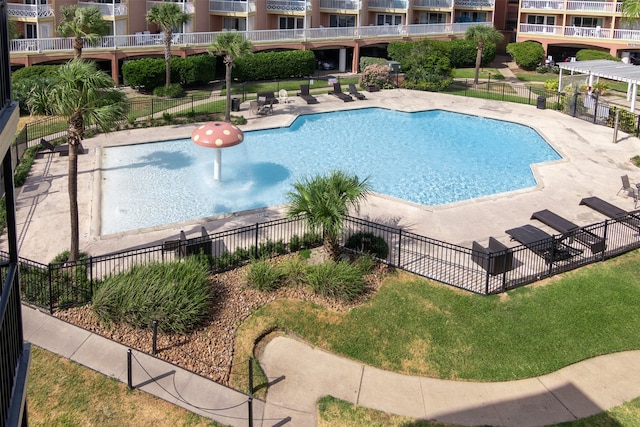 view of swimming pool with a pergola and a patio