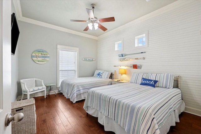 2904 Shady Ln, Crystal Beach, TX 77650 - bedroom with crown molding, dark hardwood / wood-style floors, and ceiling fan