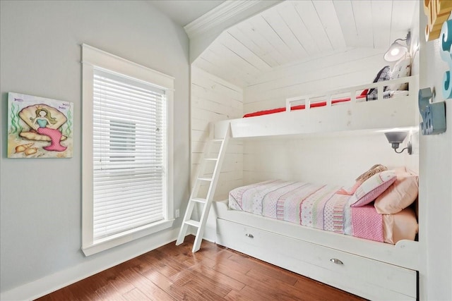 2904 Shady Ln, Crystal Beach, TX 77650 - bedroom with wood-type flooring and wooden ceiling