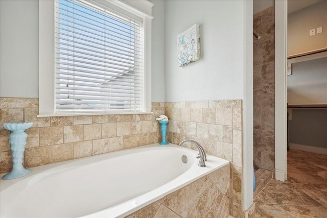2904 Shady Ln, Crystal Beach, TX 77650 - bathroom featuring separate shower and tub and tile patterned floors