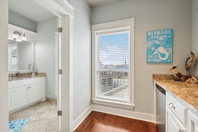 2904 Shady Ln, Crystal Beach, TX 77650 - bathroom with vanity and wood-type flooring