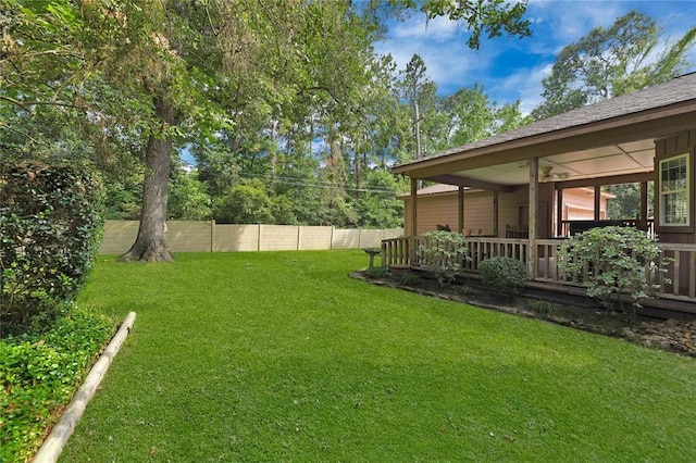 view of yard featuring fence