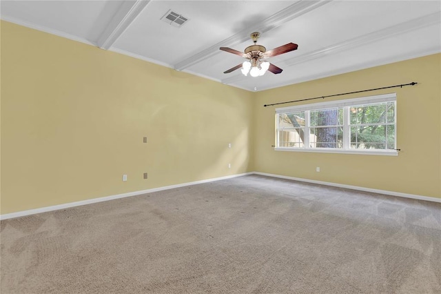 carpeted empty room featuring a ceiling fan, beamed ceiling, visible vents, and baseboards