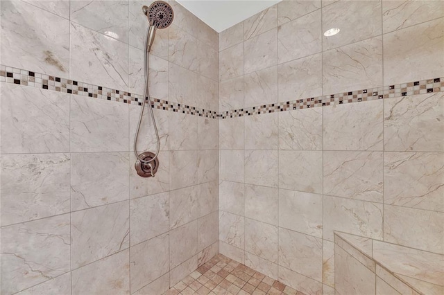 details with a tile shower