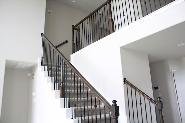 stairway with a high ceiling