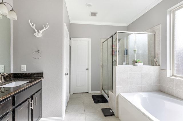 bathroom with shower with separate bathtub, ornamental molding, vanity, and tile patterned floors