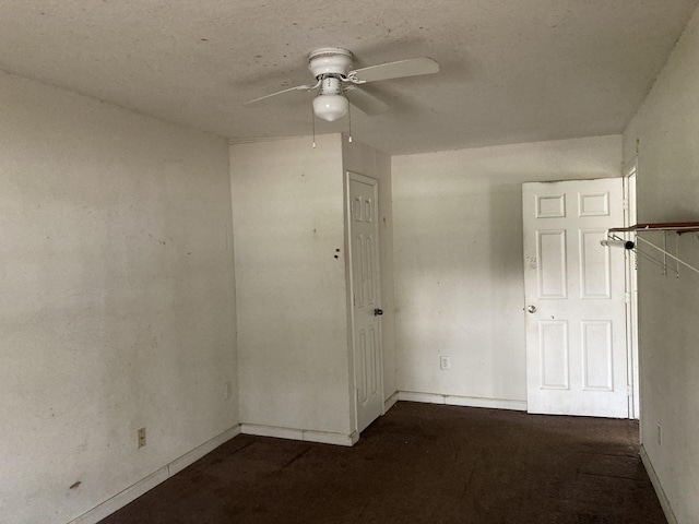 unfurnished room featuring ceiling fan