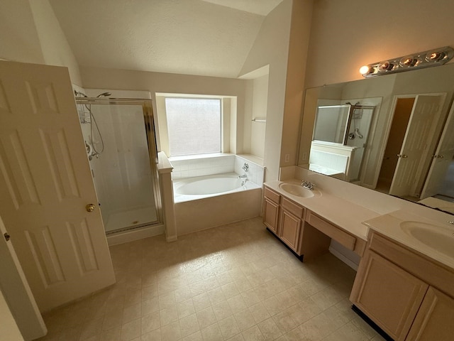 bathroom with vanity, vaulted ceiling, shower with separate bathtub, and a textured ceiling