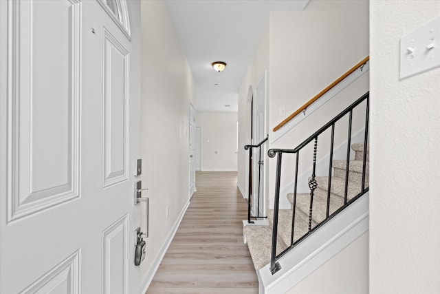 hall featuring light wood-type flooring