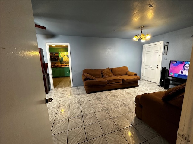 living room featuring a chandelier