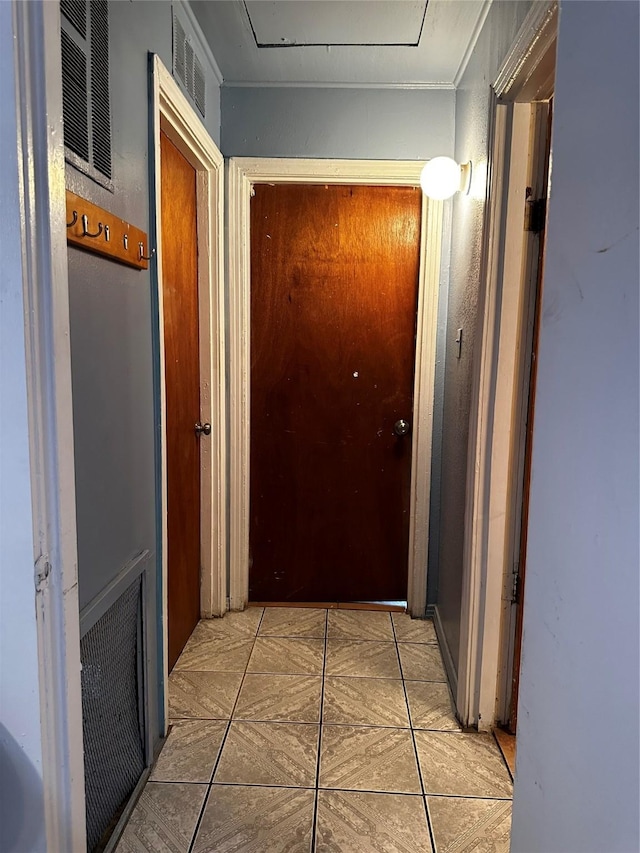 hallway with light tile patterned floors