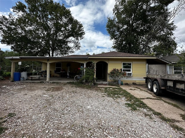 view of front of property with cooling unit