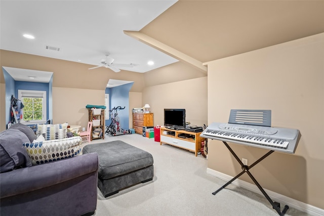 carpeted living room featuring baseboards, a ceiling fan, visible vents, and recessed lighting