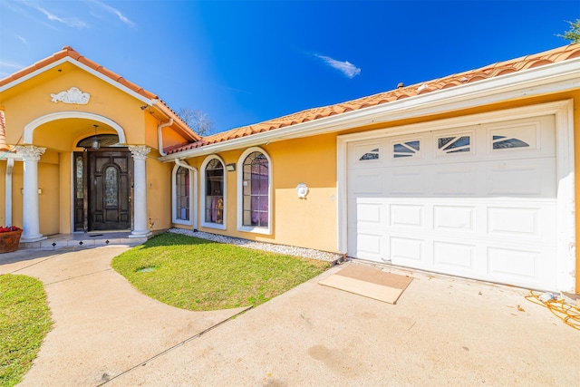 view of front of home featuring a garage