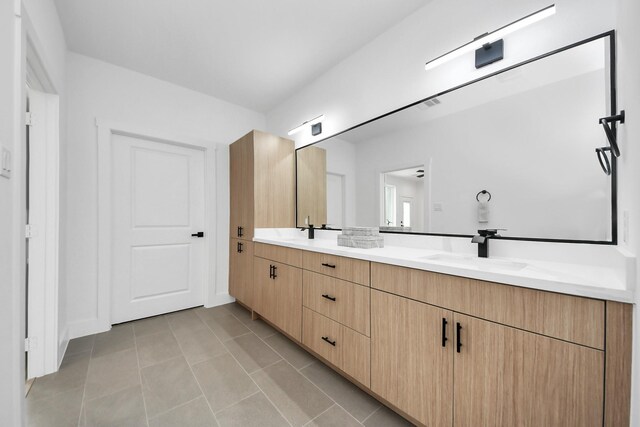 9026 Scott St, Houston, TX 77051 - full bath featuring a sink, visible vents, double vanity, and tile patterned flooring