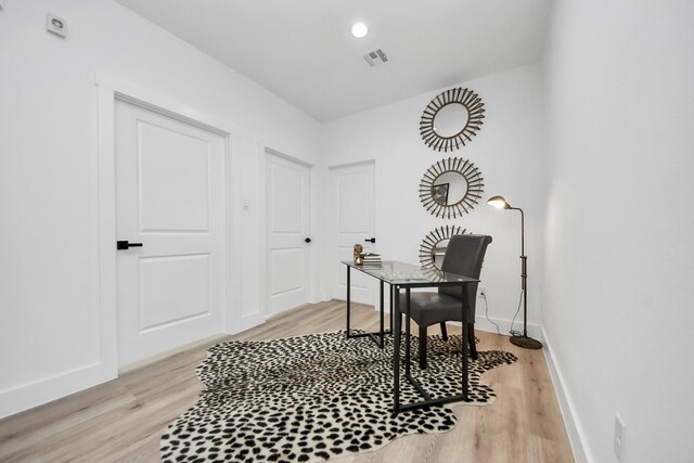 9026 Scott St, Houston, TX 77051 - office area with light wood finished floors, baseboards, and visible vents