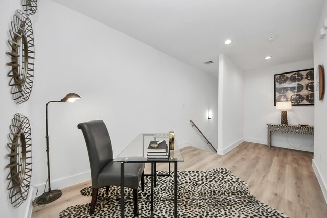 9026 Scott St, Houston, TX 77051 - office area with recessed lighting, visible vents, baseboards, and wood finished floors