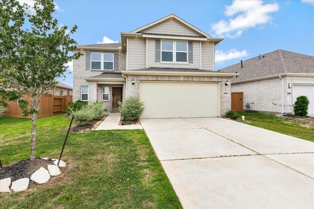 view of property with a garage and a front yard