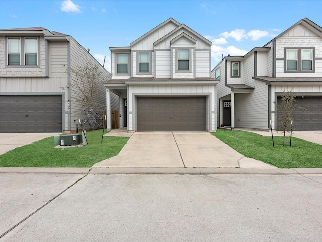 view of front facade with a garage and a front yard