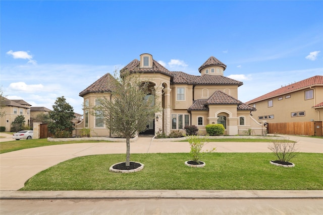 18111 Dockside Landing Dr, Cypress, TX 77433 - mediterranean / spanish house with a tile roof, curved driveway, and stucco siding